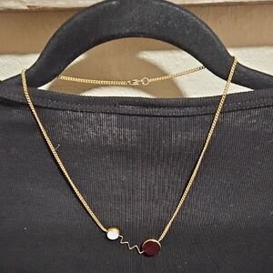 Elegant Gold and Red Necklace